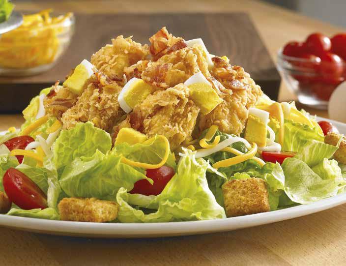 99 S AUSSIE COBB SALAD Grilled or crispy chicken, fresh mixed greens, chopped hard-boiled eggs, tomatoes, bacon, Monterey ack and Cheddar cheese and freshly made croutons.
