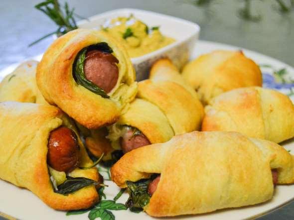 Herb and Cheese Pigs in Blankets By Freshherbs.com Total Time: 1 hour Yield: 16 pieces If you need more proof that fresh rosemary adds a touch of class to any dish, then look no further.