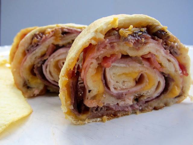 Baked Club Pinwheels Prep time: 5 Minutes Cook Time: 23 Minute Total Time: 28 Minutes SERVES: 8-10 Ingredients: *12 slices Pre-cooked or Home cooked Bacon, chopped * 2 (11-oz) cans Pillsbury