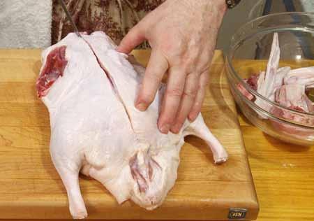 Cut carefully so as to only cut away the wing without damaging the breast meat.