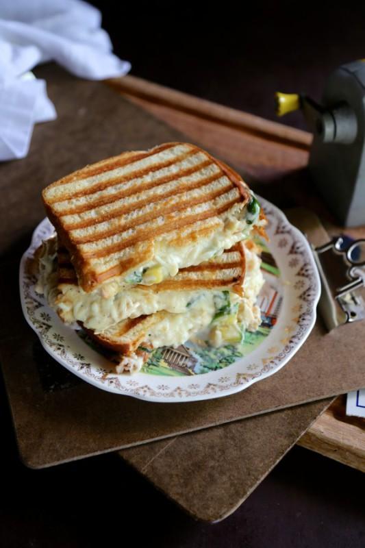 Greek Yogurt Chicken Alfredo Grilled Cheese Yield: Makes 2 Sandwiches Prep Time: 20 minutes Cook Time: 20 minutes Ingredients: Four slices whole wheat bread 4 tablespoons unsalted butter, room