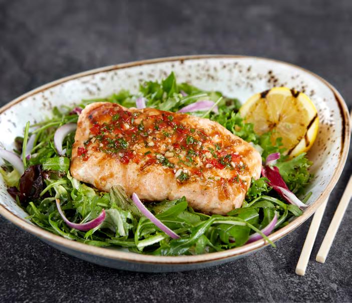 Lemongrass Mint Salmon Flame-grilled salmon topped with a slightly sweet mint sauce served on a bed of fresh arugula