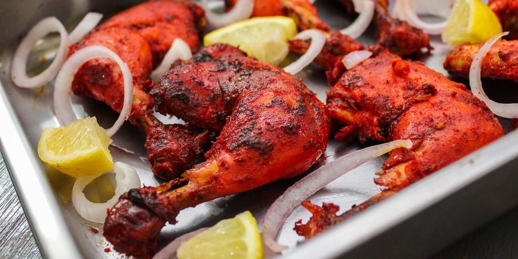 pepper, coriander powder. smoked paprika, salt, red food color, and lemon juice. Put chicken pieces in the above marinade and coat them well. Take a zip-lock bag and put the marinated chicken in them.