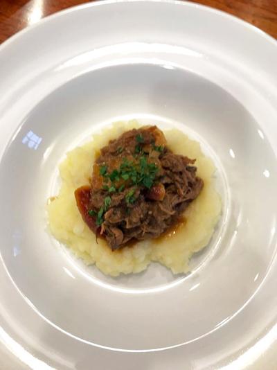 There are plenty of recipes for brisket so you should do some exploration, but I make up a simple recipe that provided a tender, shredded and succulent addition to mashed potatoes.