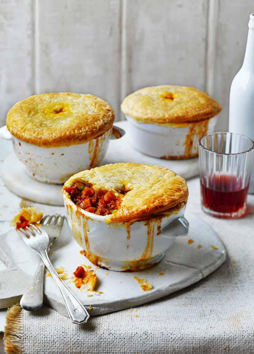 Lamb, Tomato and Sweet Potato Pot Pies Prep: 45 mins Cooking: 1 hour SERVES: 4 1 tbs olive oil 1 onion, finely chopped 2 garlic cloves, finely chopped 500g lamb mince 1 stalk celery, finely diced