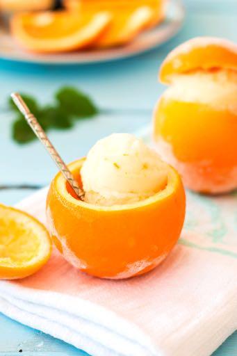 Sweet Orange Lemon Balm Sorbet A light and refreshing sorbet for summer! Serving in orange cups is a must!