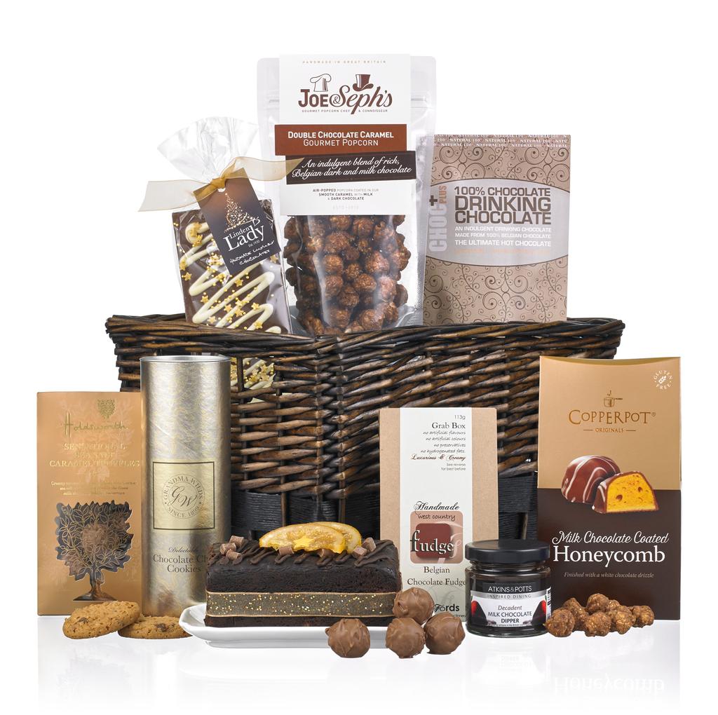 CHOCOLATE COLLECTION Presented in a willow basket containing: Atkins & Potts Milk Chocolate Dipper 100g Choc + Drinking Chocolate Copperpot Milk Chocolate Coated Honeycomb 100g Gold Crown Chocolate
