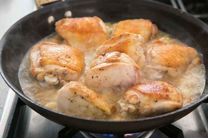 Working in batches, brown the chicken pieces on all sides, about 2 to 3 minutes per side. Lay the chicken pieces on the hot oil, do not move until browned, then turn over to other side using tongs.