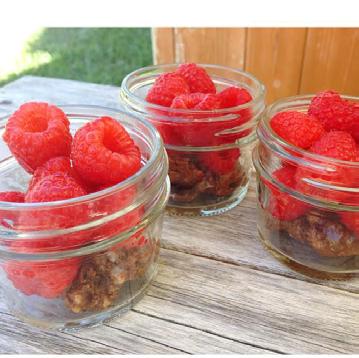 SNACKS Cocoa Almond Treats [Makes 8-12 Servings] 1 cup natural almond butter (soft is easier to mix) ½ cup unsweetened cocoa 2 tablespoons raw honey 1 cup crispy rice cereal fresh berries to top with!