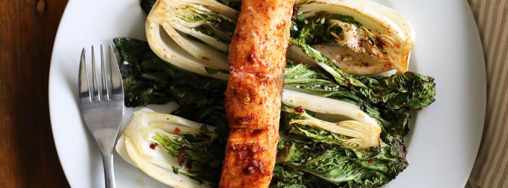 One Pan Honey Garlic Salmon with Bok Choy 10 ingredients 20 minutes 4 servings 1. Preheat oven to 510 and line a baking sheet with parchment paper. 2. In a bowl, whisk together the honey, half of the tamari, minced garlic and chili powder.