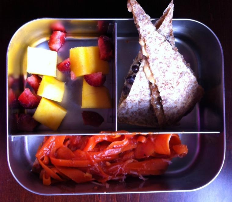 Toddler Lunch: Day 1 Today is a really quick and easy lunch to put together. We have fresh mango and strawberries, a black bean and cheese quesadilla, and some carrot pasta.