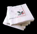 napkin with red and green printed holly design.