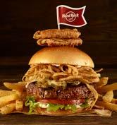 HICKORY BARBECUE BACON CHEESEBURGER A beef burger basted with hickory barbecue sauce and topped with caramelized onions, cheddar cheese, crisp seasoned bacon, crisp lettuce and vine-ripened tomato.