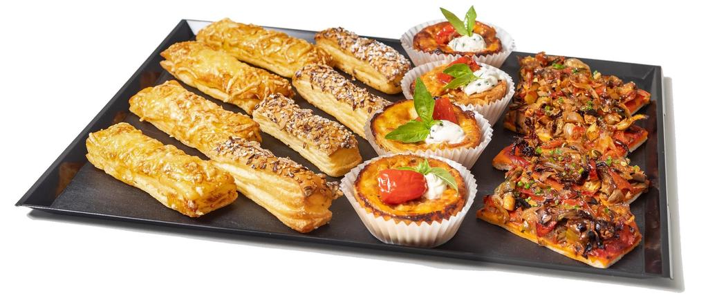 INTERNATIONAL TRAYS Baked selection 47.00 Quiche Lorraine Galician pie Samosas Baguette bread with tex-mex style chicken Dip Selection 30.
