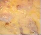 Easy Cheesy Pork Chops 4 boneless pork chops 3 potatoes, peeled and cut into chunks 1 large white onion, cut up 1 (10 1/2 ounce) cans cheddar cheese soup milk ( enough to fill up can) olive oil (