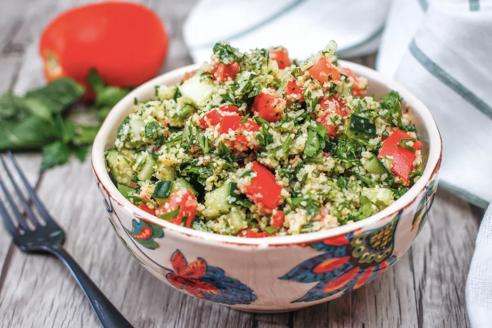 Classic Tabbouleh Salad a.k.a. tabouli is made with cracked wheat bulgur, parsley, tomatoes, and a bright garlic mint dressing.