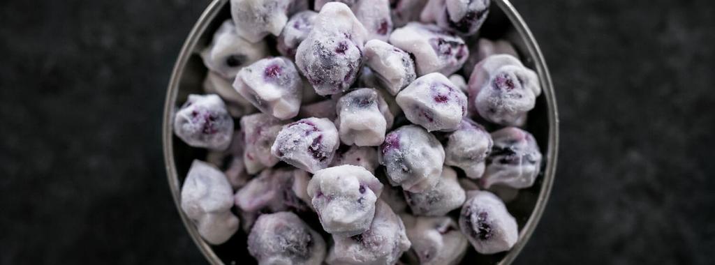 Frozen Yogurt Covered Blueberries 2 ingredients 40 minutes 4 servings 1. In a bowl, combine blueberries and yogurt until well coated. 2. Line a baking sheet with parchment paper.