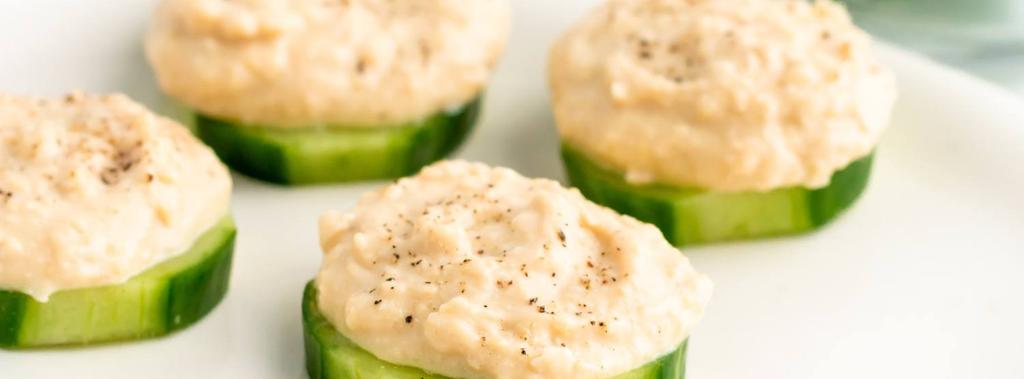 Cucumber Hummus Bites 3 ingredients 10 minutes 4 servings 1. Slice cucumber into 1/4-inch thick rounds. 2. Top each round with 1 to 2 teaspoons of hummus and a pinch of black pepper.