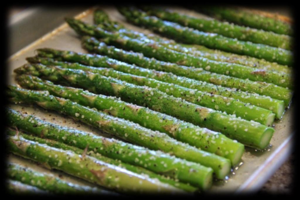 fresh asparagus, bottom 2 inches removed 2 cloves garlic (minced) OR 2 tsp. jarred, minced garlic 2 tsp. extra virgin olive oil 1 tbsp. fresh lemon juice (or from jar) 1/2 tsp.