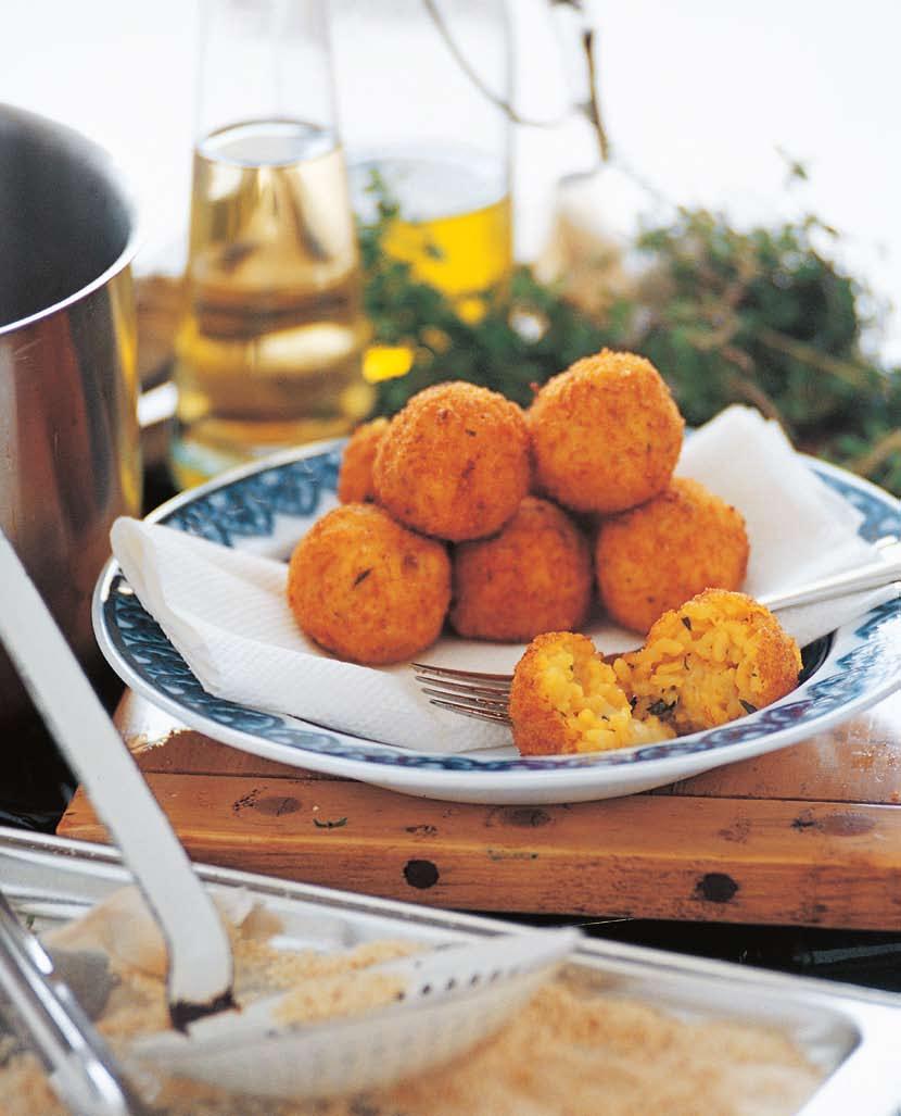Arancini Fried Rice Balls with Thyme Arancini the name means little oranges are a speciality of Sicily. The saffron risotto is traditional.