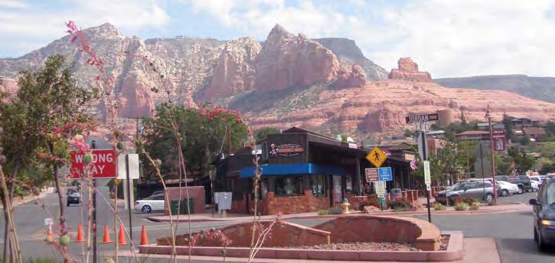 Sedona is between the Grand Canyon and Phoenix, which is over 100 miles in either direction.