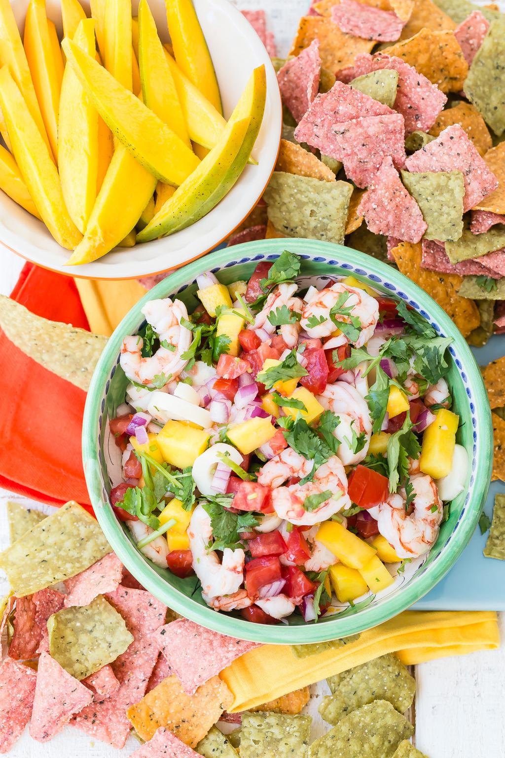 mango shrimp ceviche recipe Produce 1 red onion 2 tomatoes 1 fresh lime, juiced 1 mango 1/4 cup chopped cilantro Meat 1 pound large shrimp, cooked Prep time: 20 minutes Serves 6-8 Packaged Items 1