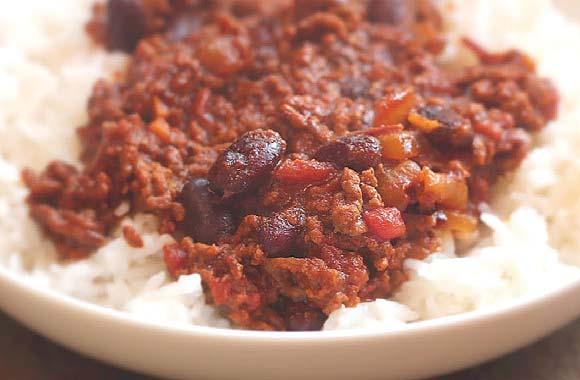 Chilli Con Carne 15 minutes Cooking time: 6-8 hours Servings: 4-6 2 tbsp olive oil 2 large onions, halved and sliced 3 large garlic cloves, chopped 2 tsp mild chilli powder 2 tsp ground cumin 2 tsp