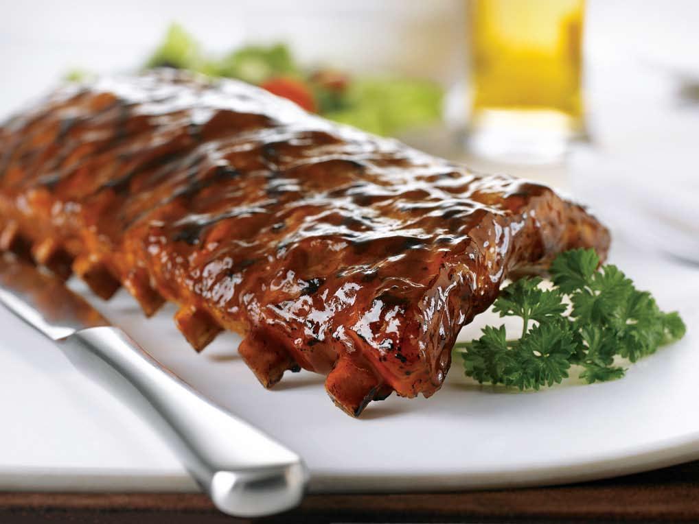 smoke house ribs SLOW SMOKED in HICKORY All pork ribs served with our famous cornbread and choice of side.