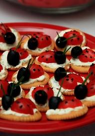 Bug Crackers Ingredients: Ritz crackers, cream cheese spread (use veggie cream cheese), cherry tomatoes, ripe olives, black sesame seeds (or poppy seeds), chives.