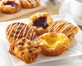 Danish Pastries Signature Danish Selection Code: 881476 A selection of three, dessert-inspired, melt-in-themouth Danish pastries in Strawberry Cheesecake, Toffee Apple and Cherry Almond flavours.