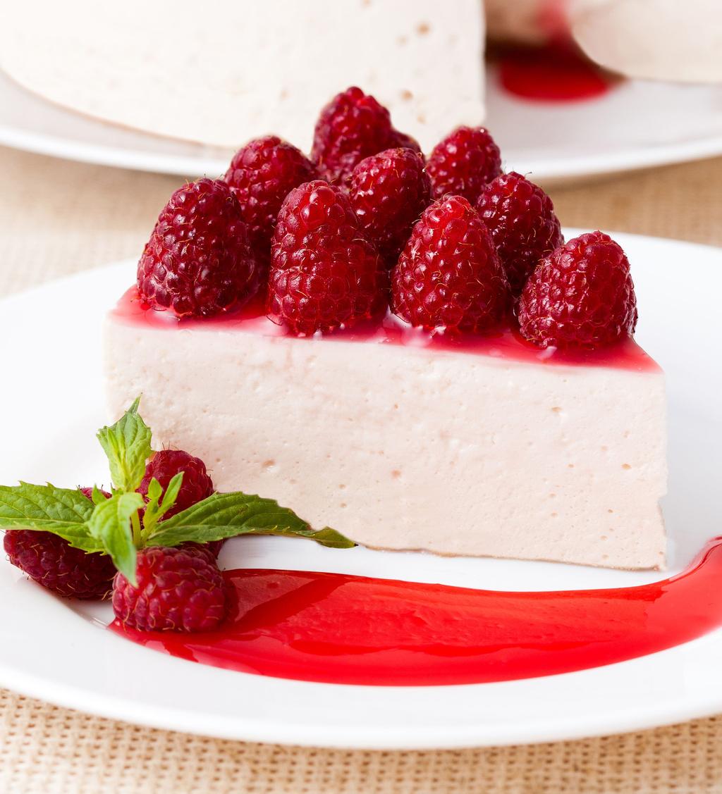 CHEESECAKE: WHITE CHOCOLATE RASPBERRY INGREDIENTS: 3 8-oz packages of cream cheese, softened 3 eggs 1 cup sour cream 1 cup sugar 3 Tbsp. flour 1 tsp.