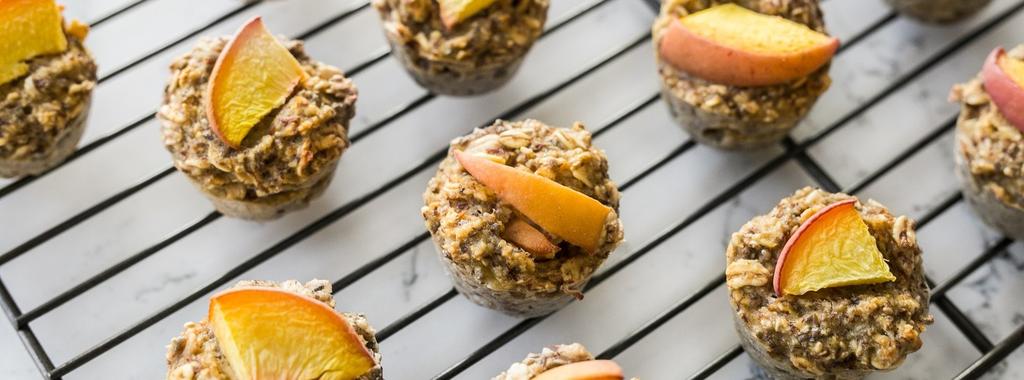 Mini Harvest Peach Oatmeal Muffins 9 ingredients 20 minutes 16 servings 1. Preheat oven to 350 F. Prepare silicone mini muffin cups on a tray, or use a mini silicone muffin tray. 2. In a mixing bowl, mash the banana with the back of a fork.