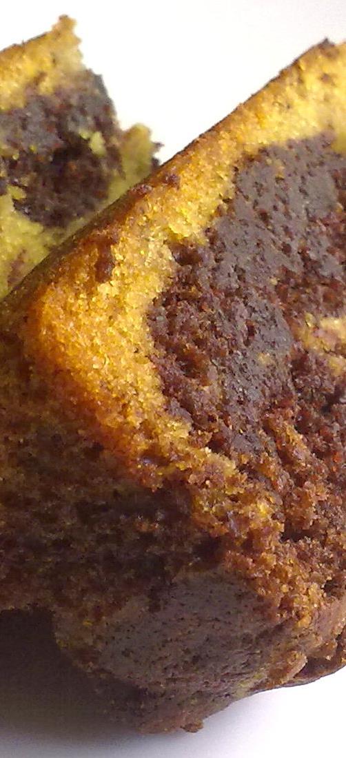 Banana Chocolate Cake 2 cups all- purpose flour; 1 cup sugar; 1 tsp baking powder; 1/2 tsp baking soda; 1 tsp salt; 1/2 tsp ground cinnamon; 1/2 tsp ground nutmeg; 1/2 tsp ground cloves; 1/2 tsp
