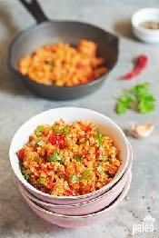 Spicy Mexican Rice Yields 4 servings Total Cooking Time 20 minutes 4 cups cauliflower florets 2 tbsp coconut oil 1 onion, chopped 3-4 cloves of garlic, minced 4 medium tomatoes, chopped 1 fresh chili
