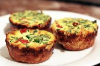 Mini Quiches Yields 3 servings 2 teaspoons coconut oil ¾ cup packed grated zucchini ¾ cup packed grated carrots 2 green shallots, green ends trimmed off, white finely chopped 4 large eggs, whisked 2