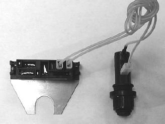 Remove the igniter cap, spring assembly, battery and lock nut from Igniter. (See Fig.
