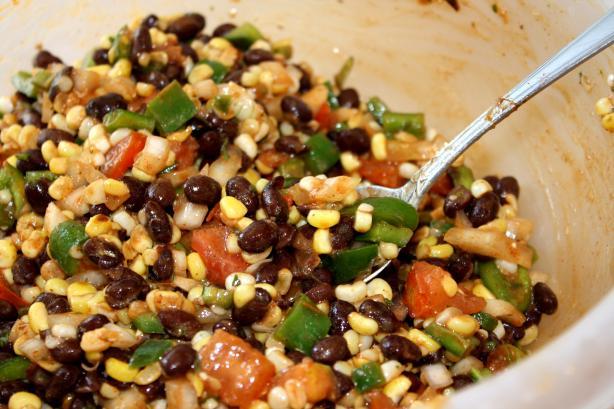 3. To serve, Place a scoop of hot rice in a bowl or on a plate, top with a generous scoop of the black bean mixture. 4. Stir together before eating.