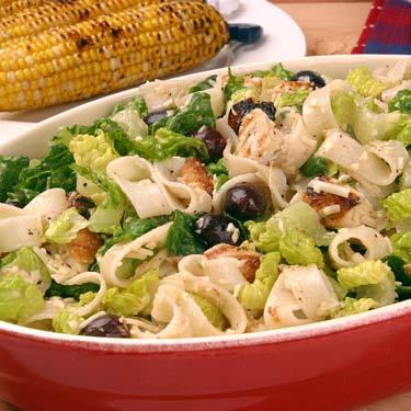 Chicken and Pasta Caesar Salad Leftover chicken, bottled dressing and Rice Pasta make this a quick and delicious one-dish dinner. It s the perfect picnic packer!