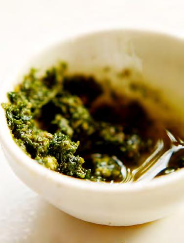 Spinach Pesto Serves: 8 Serving Size: 1 1/2 cups 1 pound pasta (try whole wheat) 3-4 cloves garlic* 1 package frozen, chopped spinach* (thawed, undrained) 1/3 cup olive oil 1/2 teaspoon salt (omit if