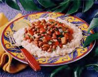 Company Rice with Beans Serves: 4 Serving Size: 2 cups 1 cup uncooked brown rice* 2 cups water 1 tablespoon canola or olive oil 1 medium onion*, chopped (~1/2 cup) 2 medium tomatoes*, chopped (~2