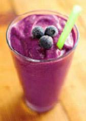 Coconut and Berry Smoothie 200ml coconut milk 50g blueberries 50g blackberries 1 tsp almond butter 1 small banana ½ tsp cacao powder sprig of mint ice cubes Place ingredients into blender and blend