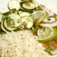Mexican Tilapia 4 (4 ounce) fillets tilapia 1 (10 ounce) can diced tomatoes with green chile peppers 1 lime, juiced 4 tablespoons minced fresh cilantro 1 lime, thinly