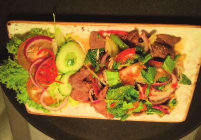 95 Grilled pork Thai style mixed with red onion, coriander, spring onion & mint Thai Salad with Fresh Fruit 7.
