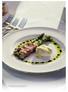 Asparagus wrapped in Parma ham with a warm poached egg and chervil Hollandaise (GF)